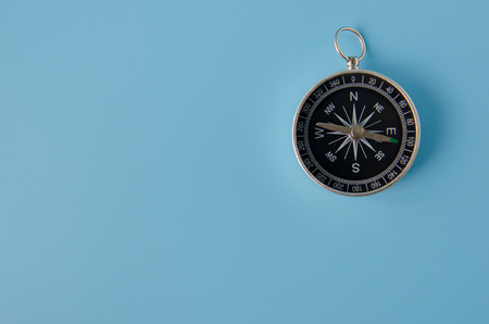 Compass on a blue backgroundの写真素材