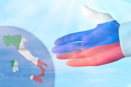 Russian flag on hand of help. Concept on the topic of helping from Russia for Italyの写真素材