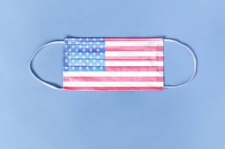 Coronavirus, Covidâ19 in United States of America. mask from coronavirus with USA flagの写真素材
