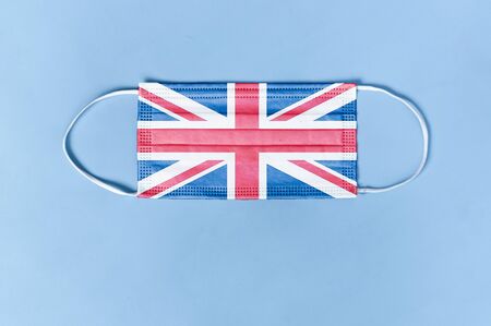 Coronavirus, Covidâ19 in Great Britan. mask from coronavirus with British flagの写真素材