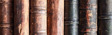 stack of old books on a library shelf. Panoramic imageの写真素材