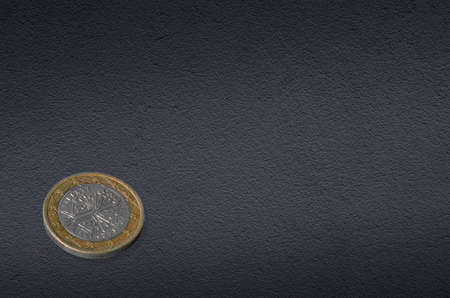one euro coin on dark backgroundの写真素材