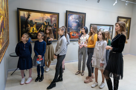 RIVNE, UKRAINE - OCTOBNER 21, 2020. Group of girls in an art galleryのeditorial素材