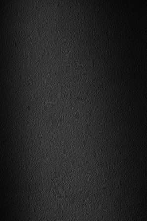 Dark asphalt texture as background. Black asphalt floor or road. Vertical imageの写真素材