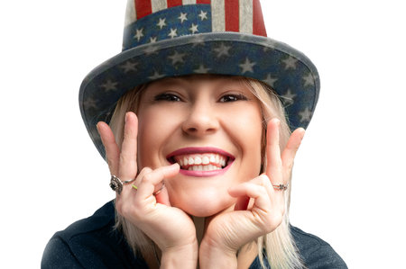 Woman wearing hat with american symbols. Beautiful beauty woman celebrating USA national traditional...