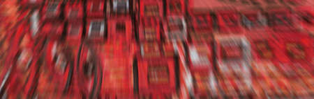 Red abstract background. Template for design, wallpaper, banner, poster. Red background from smeared paints on canvas.の写真素材