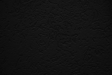 Black wall close up. Abstract background of painted black wall. Concrete black wall background.の写真素材