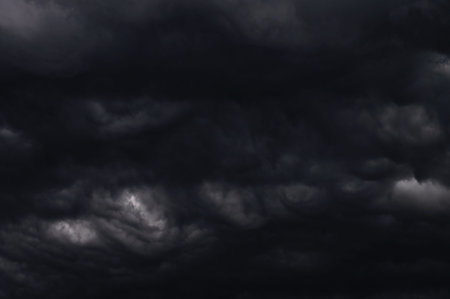 Dark storm clouds gathering in the sky creating a dramatic and moody scene