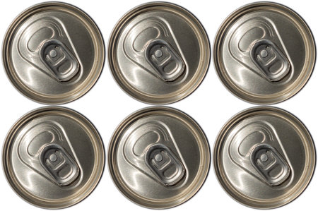 Tops of soda cans. Aluminum cans of soda background. View from the top