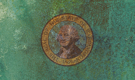 Washington State Flag. Dirty Washington state flag on rusty metal surface. Rusty metal textureの写真素材