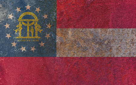 Georgia State Flag. Dirty Georgia state flag on rusty metal surface. Rusty metal textureの写真素材