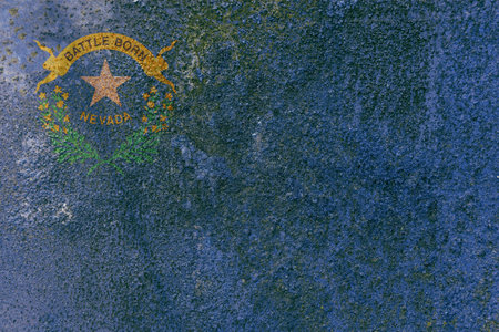 Nevada State Flag. Dirty Nevada state flag on rusty metal surface. Rusty metal textureの写真素材