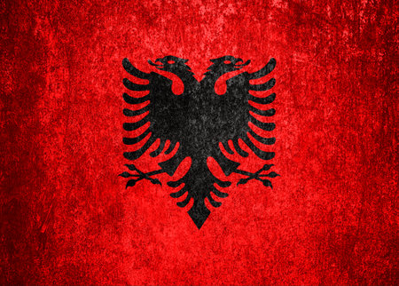 Albania State Flag. Dirty Albania flag on metal surface. Metal textureの写真素材