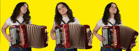 Young woman with a button accordion. Adult woman plays the button accordion on yellow background