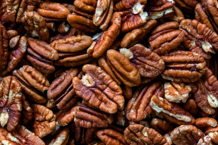 Pecan nuts. Close up of pecan nuts background. Healthy food concept. Top view