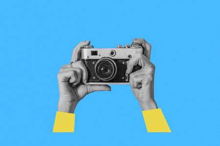 Woman taking retro photos. Digital collage with female hands holding vintage camera. Pop art design. Concept of social mediaの写真素材