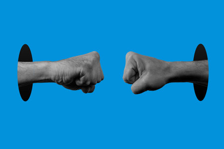 Human hand in pop art style. Retro halftone fist collage. Fight conceptの写真素材