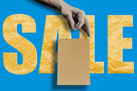 Hand with a shopping bag halftone pop art collage. Mixed media. Sale concept.の写真素材