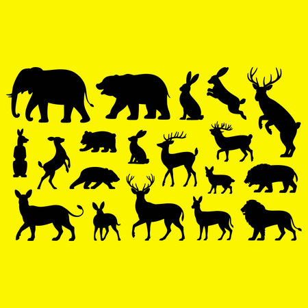 Collection of silhouettes of wild animals on a yellow background. Vector illustrationのイラスト素材