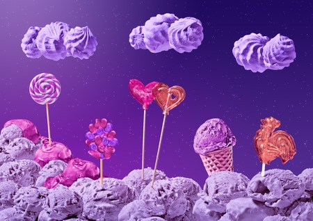 sweet landscape of ice cream and candy on the background of the night sky with stars and cloudsの写真素材