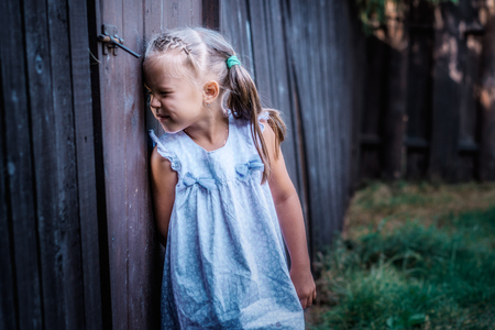 Little girl peepingの写真素材