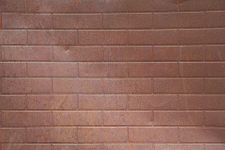 rusty brick patern embossed metal sidingの写真素材
