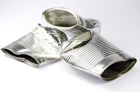 3 crushed tin cans on white backgroundの写真素材