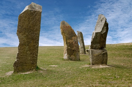 Standing stones against blue skyの写真素材