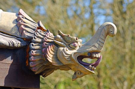 Chinese pagoda dragon head carvingの写真素材