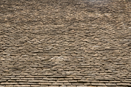 Old stone roof tilesの写真素材
