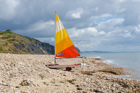 Yacht on Charmouth Beach, England