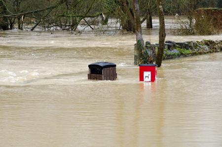 Litter bins in a floodの写真素材