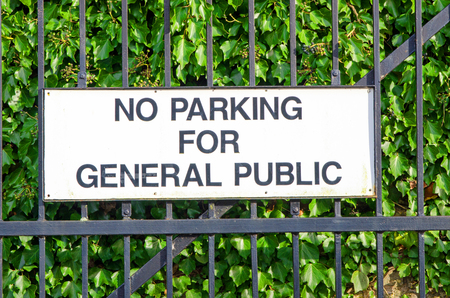 No parking sign on iron gateの写真素材