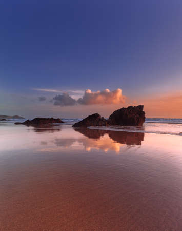 Sunset reflections on Whitsand Bay, Cornwall, UKの写真素材