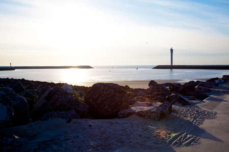 sunlight with tower in the distanceの写真素材