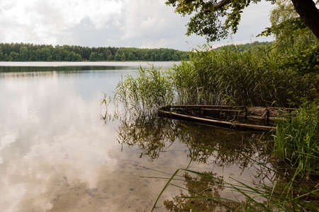 boat wreck in the waterの写真素材