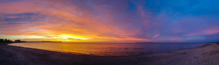 a perfect sunrise at a empty beachの写真素材