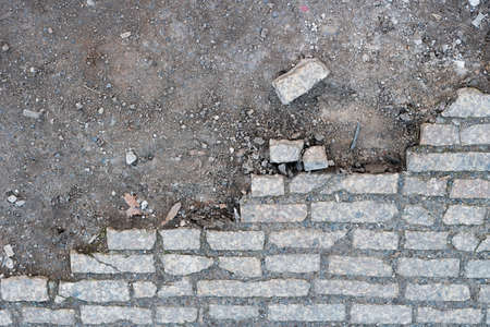 Over the big hole in the pavement footpathの写真素材