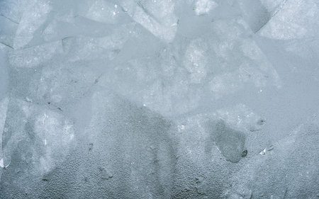 The ice tiles float on the Spree in Berlin