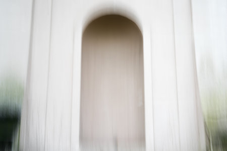 A blurry archway with a light background like in a dream