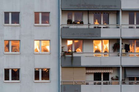 Residential house with a reflection of sunlight in the windowsの写真素材