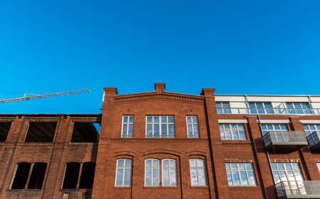Red old clinker facade modernized and not renovatedの写真素材