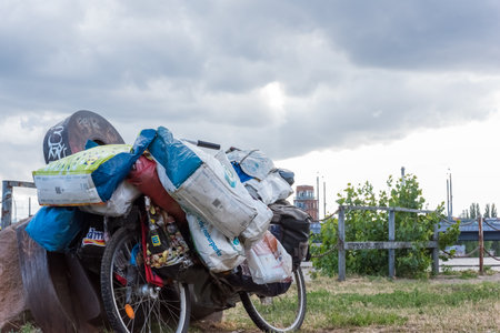 A bicycle of a homeless man with his possession, Berlin, Germany, 2018-06-21のeditorial素材