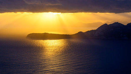 Alcudia peninsula enveloped by sunshine on the island of Majorca, Spainの写真素材