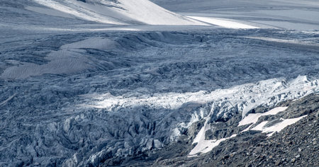 The surface of the Pasterze glacier with ice and rock in Austriaの写真素材