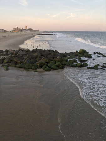 The shoreline in Ocean Grove New Jersey at sunset.