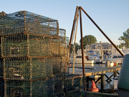 A stack of lobster traps near a marina along the Jersey shore.