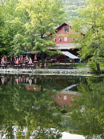 An old fashioned mountain home retreat in the Summer time.の写真素材