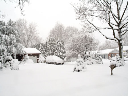 A snowy neighborhood scene in New Jersey during a blizzard.の写真素材