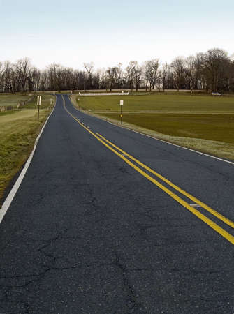 A wide angle view of a country road in the Winter.の写真素材